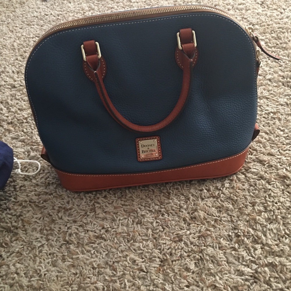 Dooney and Bourne zip zip